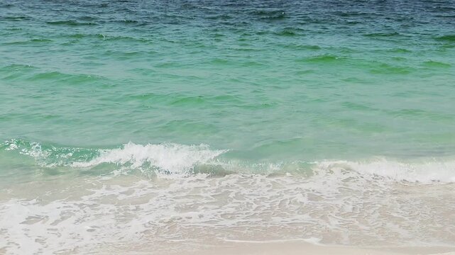 Water waves Sea Shore Beautiful Panorama white sand beach and turquoise water View. Holiday summer beach background, Wave of sea on White sandy beach. Timelapse Heavy Water Waves on Sandy Public Beach