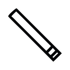 A black pencil with a sharp blade rests on a wooden table beside an open book and a steel door handle