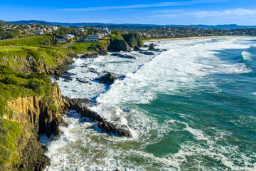 Drone aerial photograph of the rugged coastline in the Kiama suburb of Kiama Downs on the South Pacific Ocean coast in the Illawarra region on the south coast of New South Wales, Australia. 