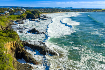 Drone aerial photograph of the rugged coastline in the Kiama suburb of Kiama Downs on the South Pacific Ocean coast in the Illawarra region on the south coast of New South Wales, Australia. 