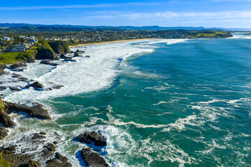Drone aerial photograph of the rugged coastline in the Kiama suburb of Kiama Downs on the South Pacific Ocean coast in the Illawarra region on the south coast of New South Wales, Australia. 