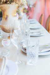 Close-up of a luxurious and elegant table setting at an outdoor event