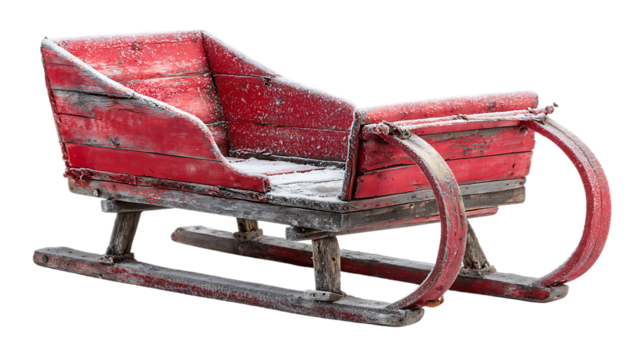 Vintage red wooden sleigh covered in snow isolated on transparent background
