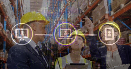 Managers wearing safety vest and hard hats checking boxes in warehouse aisle, with digital icons