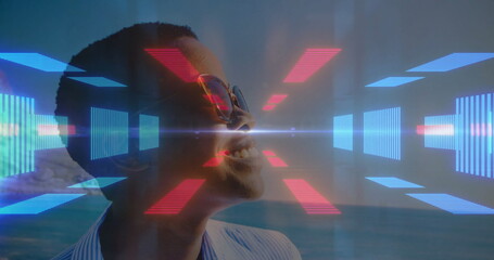 Woman in sunglasses and striped shirt smiling tilting upward at seaside with red-blue HUD bars-beam