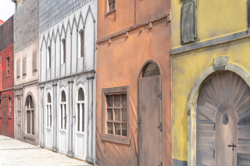 Colorful medieval street scene with painted facades