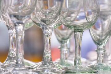 Clear wine glasses arranged in close-up on display