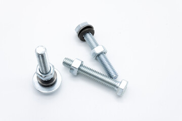 Hex head screw with washer and nut on a white background