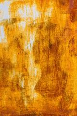 Extensive rust on a scratched metal surface with vertical white paint leftovers and dark corrosion spots