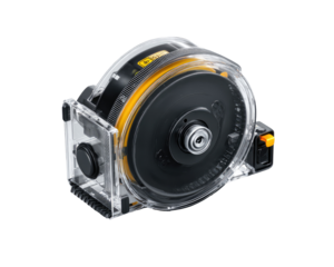 Transparent measuring tape reel with black components.  Clear plastic housing encloses a black spool of yellow tape.  Small orange button or switch.  Precise, high-tech, and portable