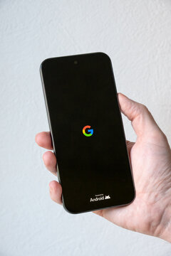 Google Pixel 10 Pro XL phone being held in a male hand