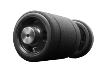 Two dark gray/black exercise wheels, likely foam-filled, with black tire-like rims and a metal center hub