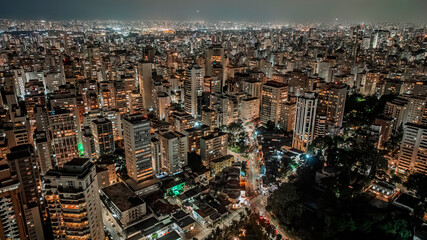 Night aerial panorama of Higienopolis district in São Paulo with countless illuminated...