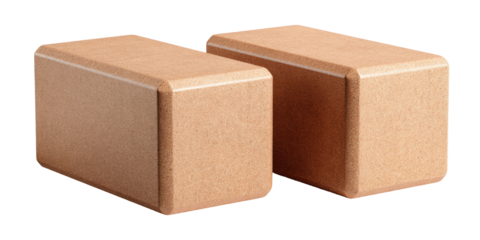 Two light beige yoga blocks, side view