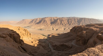 Naklejka premium Scenic Vista of a Rugged Desert Canyon at Sunset.