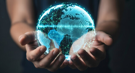 Man holding a glowing digital earth globe, global network connectivity concept. Future technology and communication.