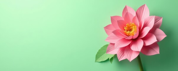 Elegant crepe paper dahlia against a soft pastel green background, subtle texture, pastel colors