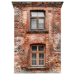 Windows set in weathered, red brick wall of a building exterior, close-up view.