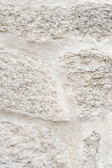 A detailed close up of a rough white stone wall texture A Perfect Background