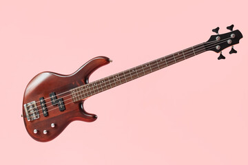 Obraz premium Modern electric guitar on pink background