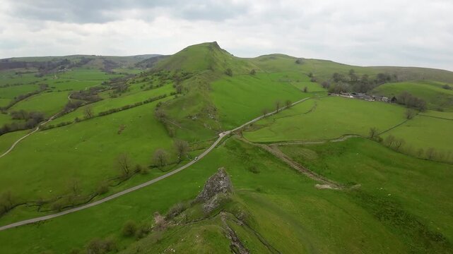 FPV drone footage of the Dragons Back in the Peak District, England. Landscape orientation.