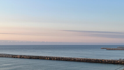 Ocean Sunset with Breakwaters