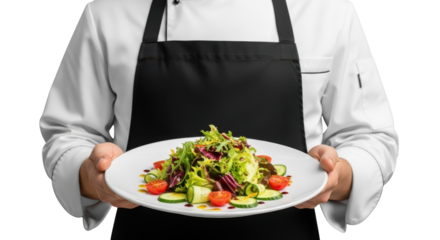 A Chef Presents a Delicious Fresh Green Salad on a White Plate