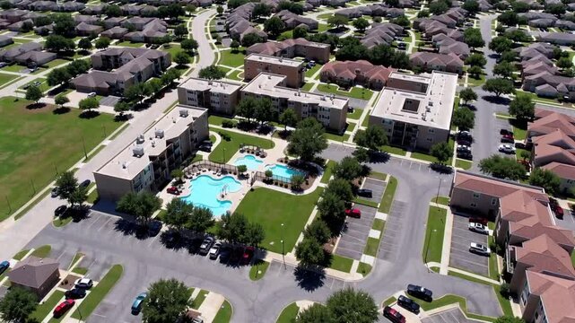 overhead perspective of multi-unit residential dwellings located in outlying district