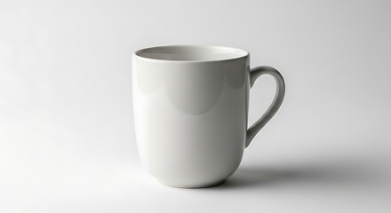 Obraz premium Simple White Mug Against a Clean Background, Minimalist Still Life.