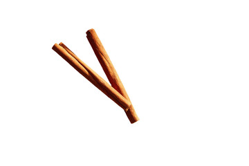 Two cinnamon sticks, slightly angled, against a black background.  They are a rich, reddish-brown color