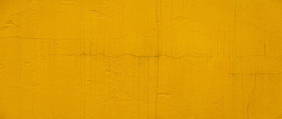 Background of Yellow concrete painted wall. Old Retro Yellow wall textured wallpaper for decoration and design, Textured colored wall and texture, texture for background