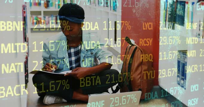 Student opening notebook and activating animated data codes around laptop while studying in library