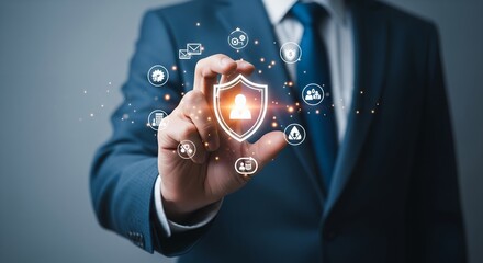Businessperson interacting with digital security shield and data protection icons