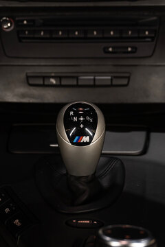 DCT gear selector with M logo in a BMW M3 E90, Close-up of a german sports sedan interior

