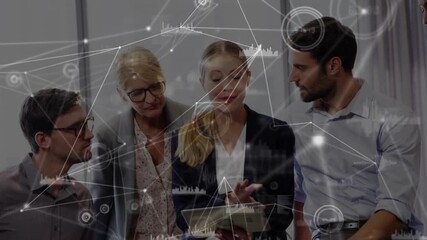 Ponytailed woman tapping tablet and team swiping charts for business analysis linking network nodes - Powered by Adobe