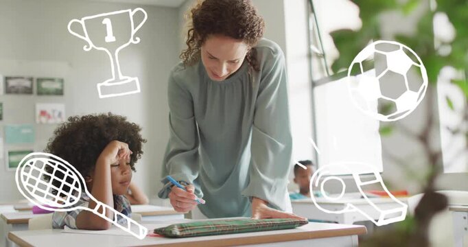 Teacher guiding boy's pen forming letters in classroom while animated icons showing achievement