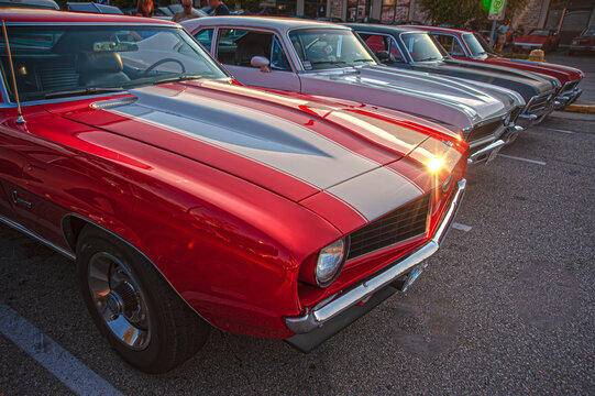 Vintage American muscle cars on display at show and shine.
