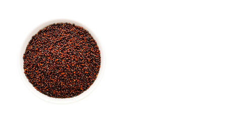 Brown mustard seeds in bowl - Brassica juncea.
