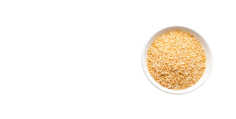Organic dried sesame seeds in the bowl - Sesamum indicum
