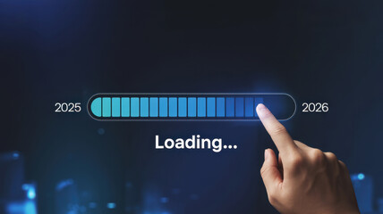 Hand touching loading progress bar with 2026 year, symbolizing anticipation and progress towards future goals and technological advancements