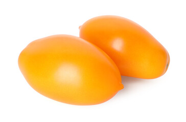 Two ripe yellow tomatoes isolated on white