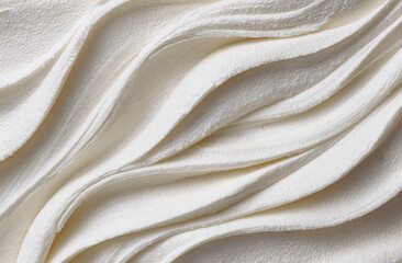Creamy, textured swirls of white substance