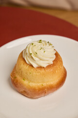 A delightful Mini Cake with creamy frosting and colorful sprinkles, perfect for any occasion