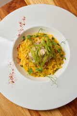 Indulge in a Luxurious Risotto featuring Chicken and Fresh Herbs, a true culinary delight