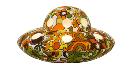 Retro groovy 70s floral UFO lamp casts ambient light, adding vibrant vintage charm to any space.