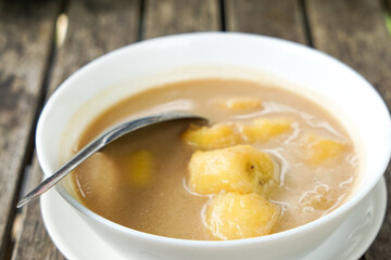 Pengat pisang, a traditional Malaysian dessert of banana simmered in coconut milk and palm sugar.