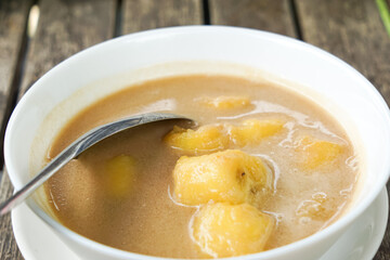 Pengat pisang, a traditional Malaysian dessert of banana simmered in coconut milk and palm sugar.