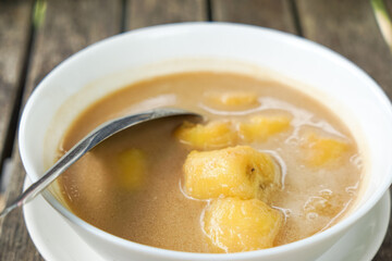 Pengat pisang, a traditional Malaysian dessert of banana simmered in coconut milk and palm sugar.