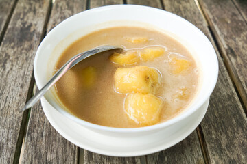 Pengat pisang, a traditional Malaysian dessert of banana simmered in coconut milk and palm sugar.