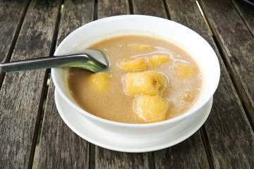 Pengat pisang, a traditional Malaysian dessert of banana simmered in coconut milk and palm sugar.